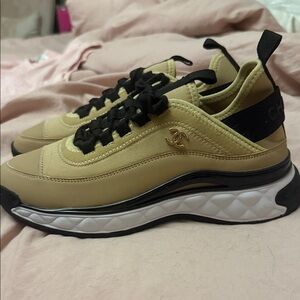 CHANEL Beige Sneakers with Black Details